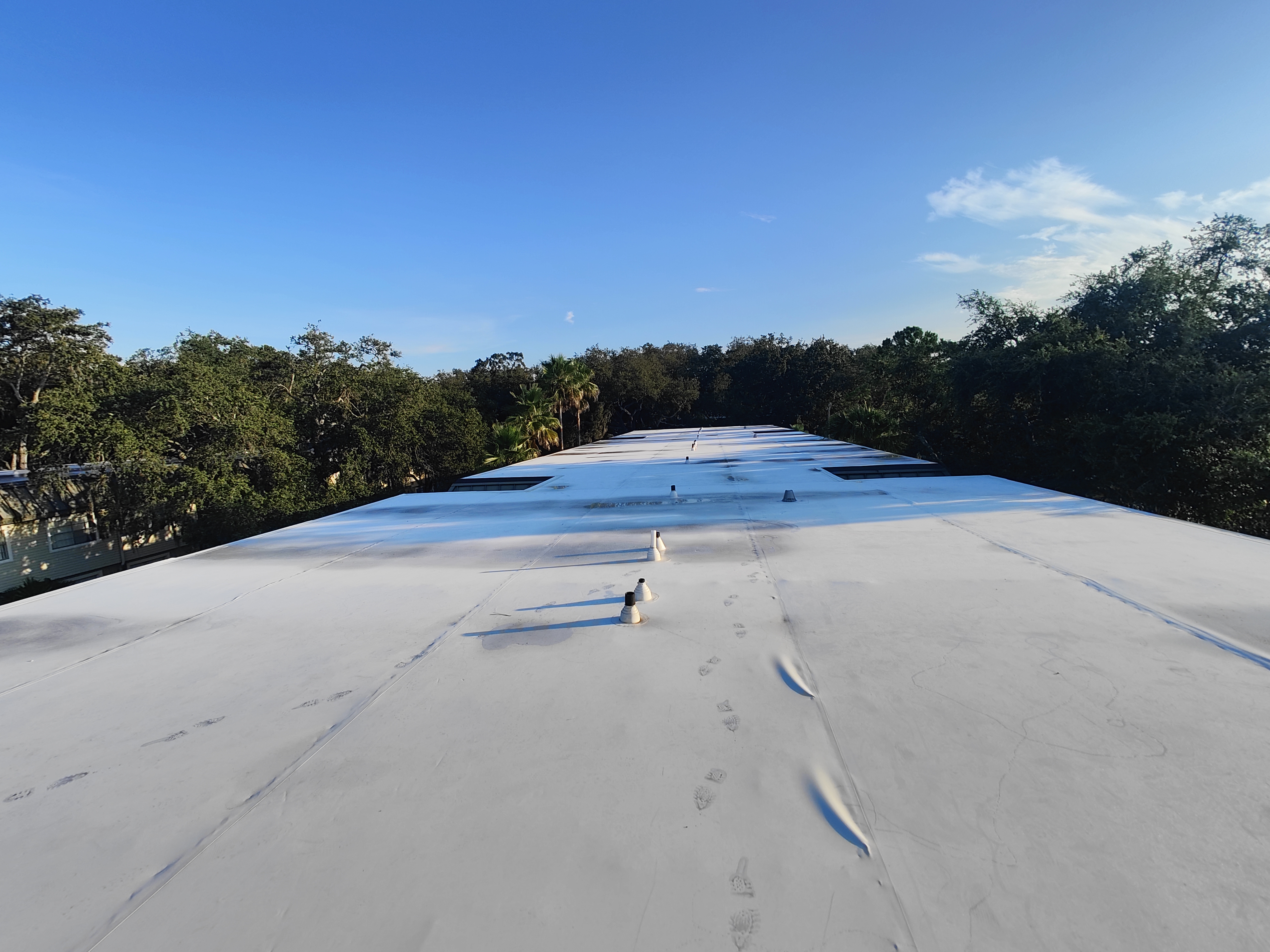 Clogged commercial roof drain cleared by Trufam
