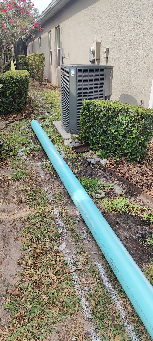 A Trufam solid drain line carrying roof and surface water away from the foundation of a Tampa Bay home