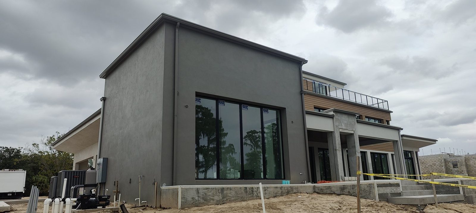 A large modern commercial building in Tampa Bay with new gutters