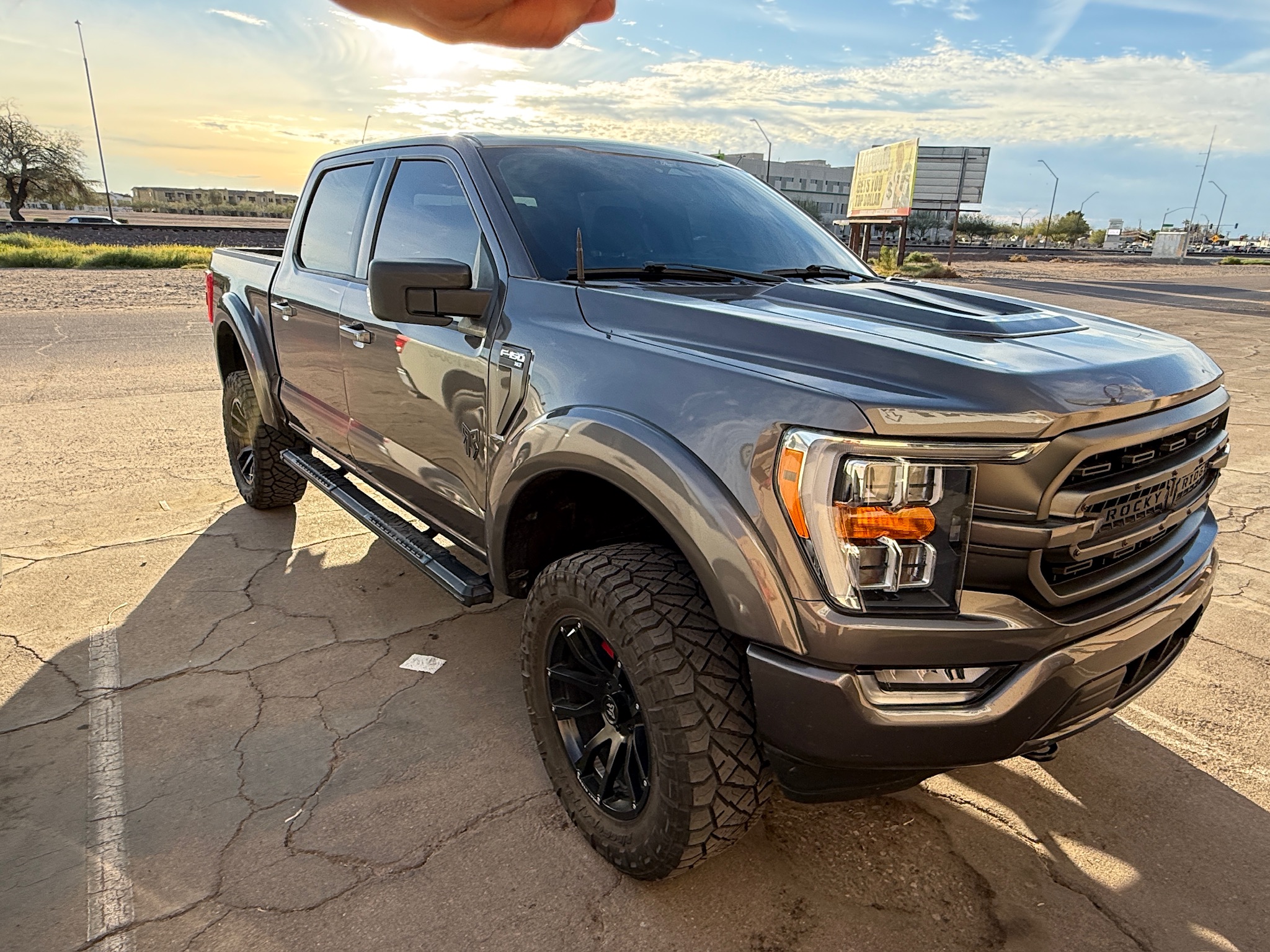 Black truck with freshly installed tint at Premier Tint & Wrap in Peoria, AZ