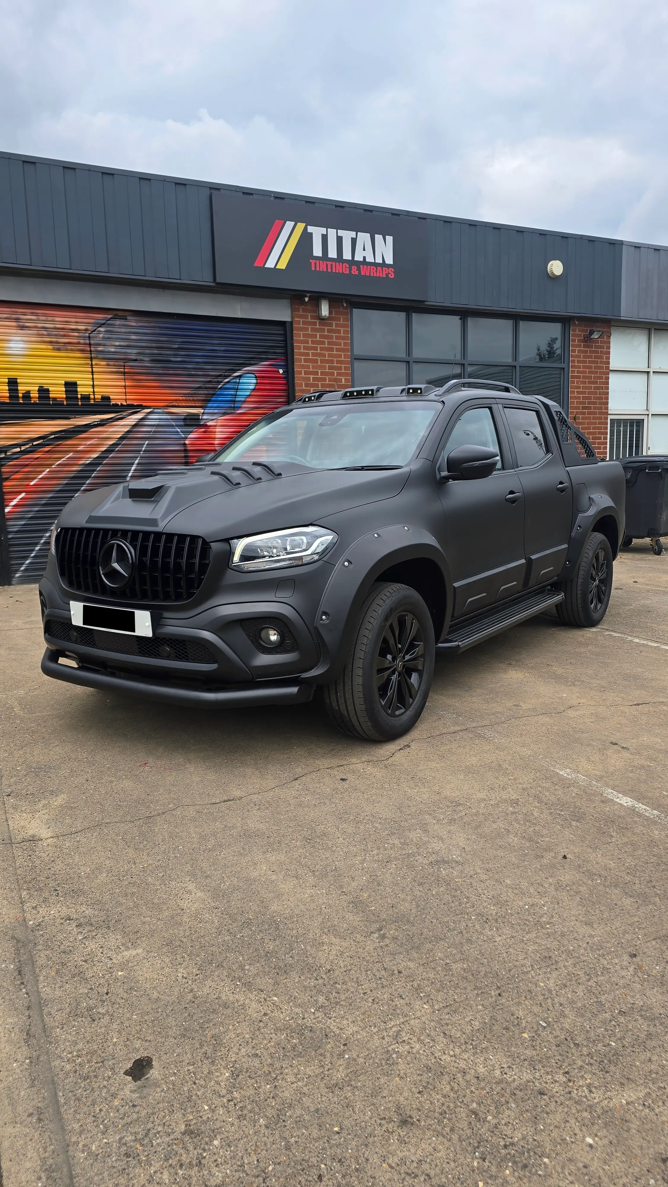 The same car after the Titan blackout package - dechromed, blacked-out alloys and tinted glass