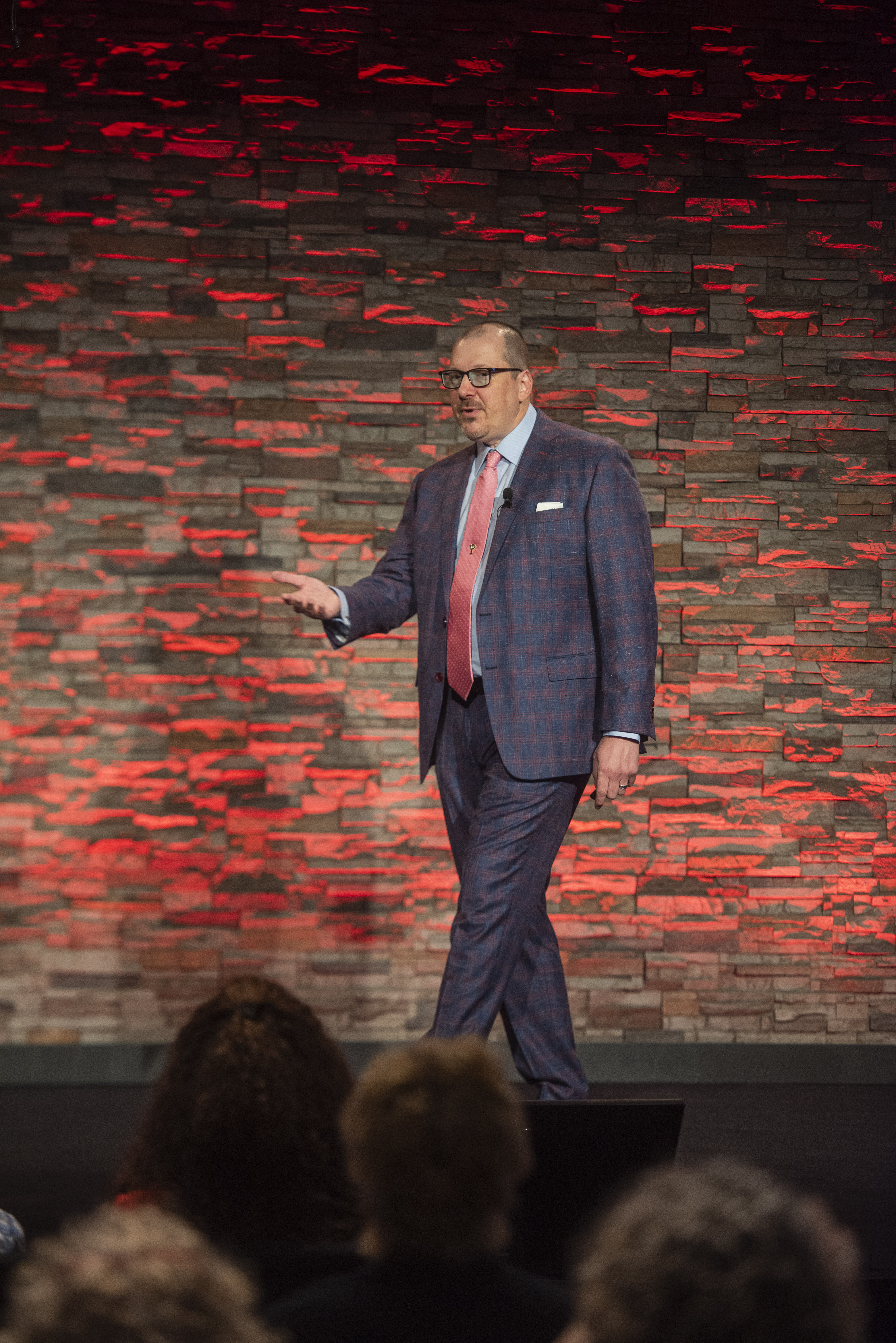 Michael Arnold speaking on stage
