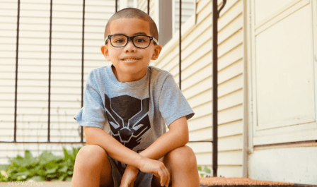 A young boy who just got fitted for glasses at Aspen Eye Care