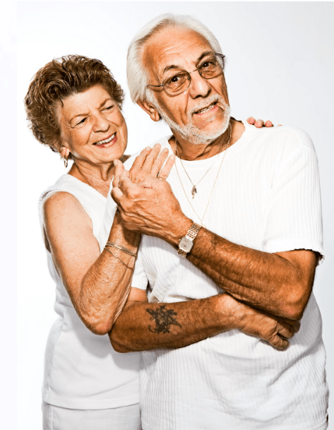 A senior couple holding hands in Sherwood Park
