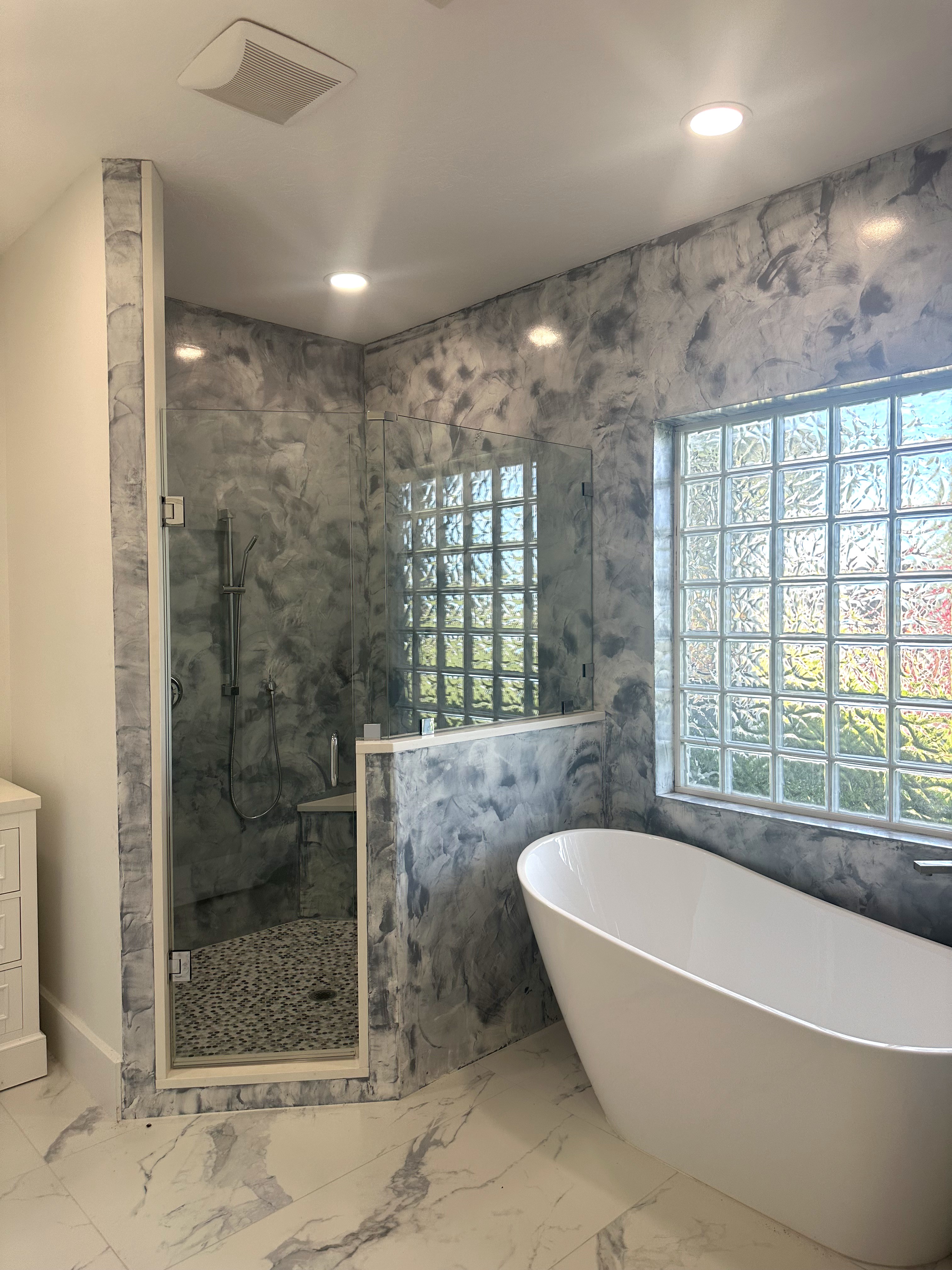 Cloud effect waterproofed Venetian plaster master bathroom Stuart FL