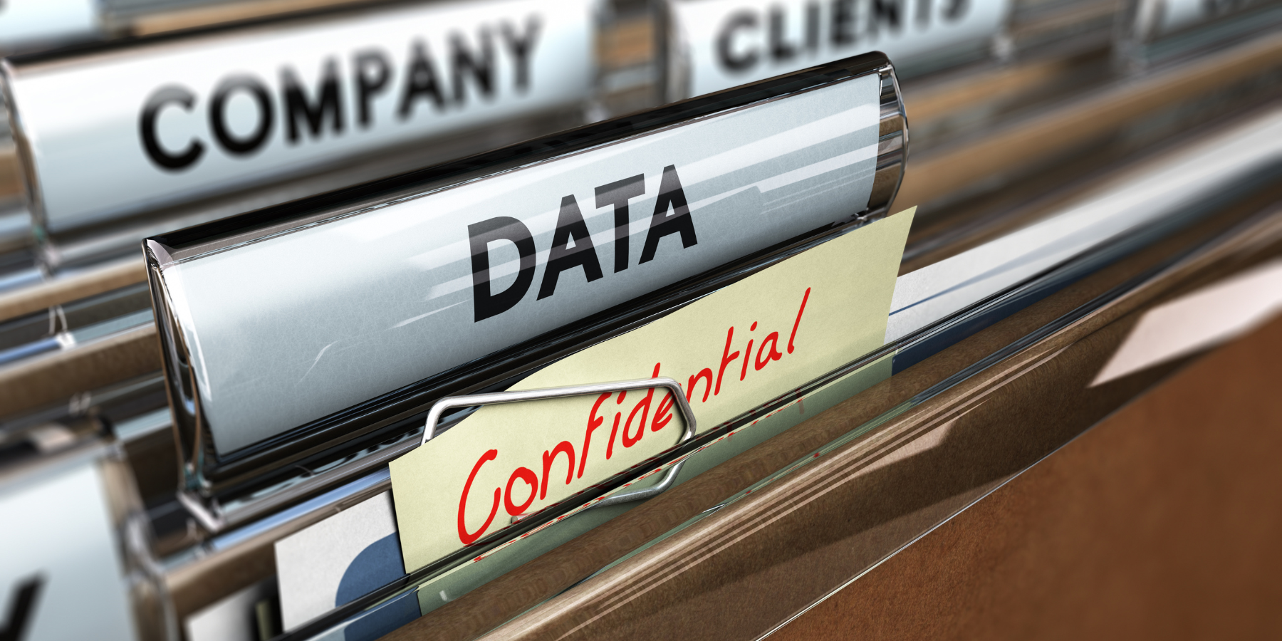 Confidential" in red script. Other folders labeled "COMPANY" and "CLIENTS" are visible in the blurred background. Confidential" in red script. Other folders labeled "COMPANY" and "CLIENTS" are visible in the blurred background.