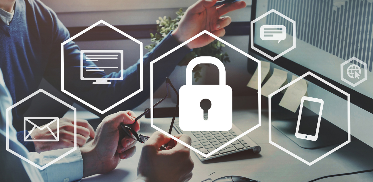 Business team using laptops and digital devices with cybersecurity icons, including a lock, email, computer, smartphone, and messaging symbols, representing secure business technology and data protection. Business team using laptops and digital devices with cybersecurity icons, including a lock, email, computer, smartphone, and messaging symbols, representing secure business technology and data protection.