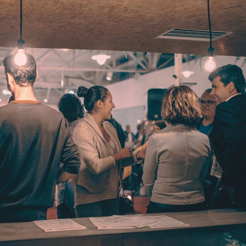 Attendees mingling and starting conversations at the Agentic Think Tank mixer