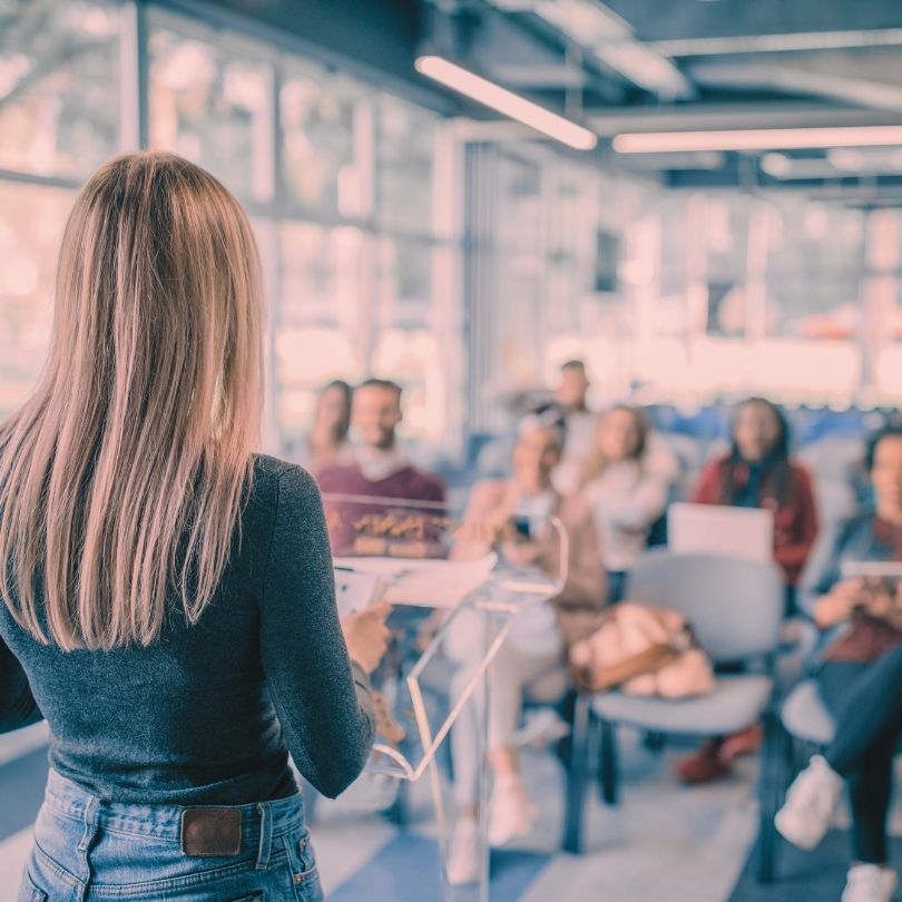 A presenter leading The Build session in front of a small group