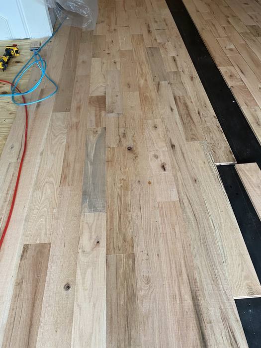 Refinished hardwood floor in a Dallas-Fort Worth home