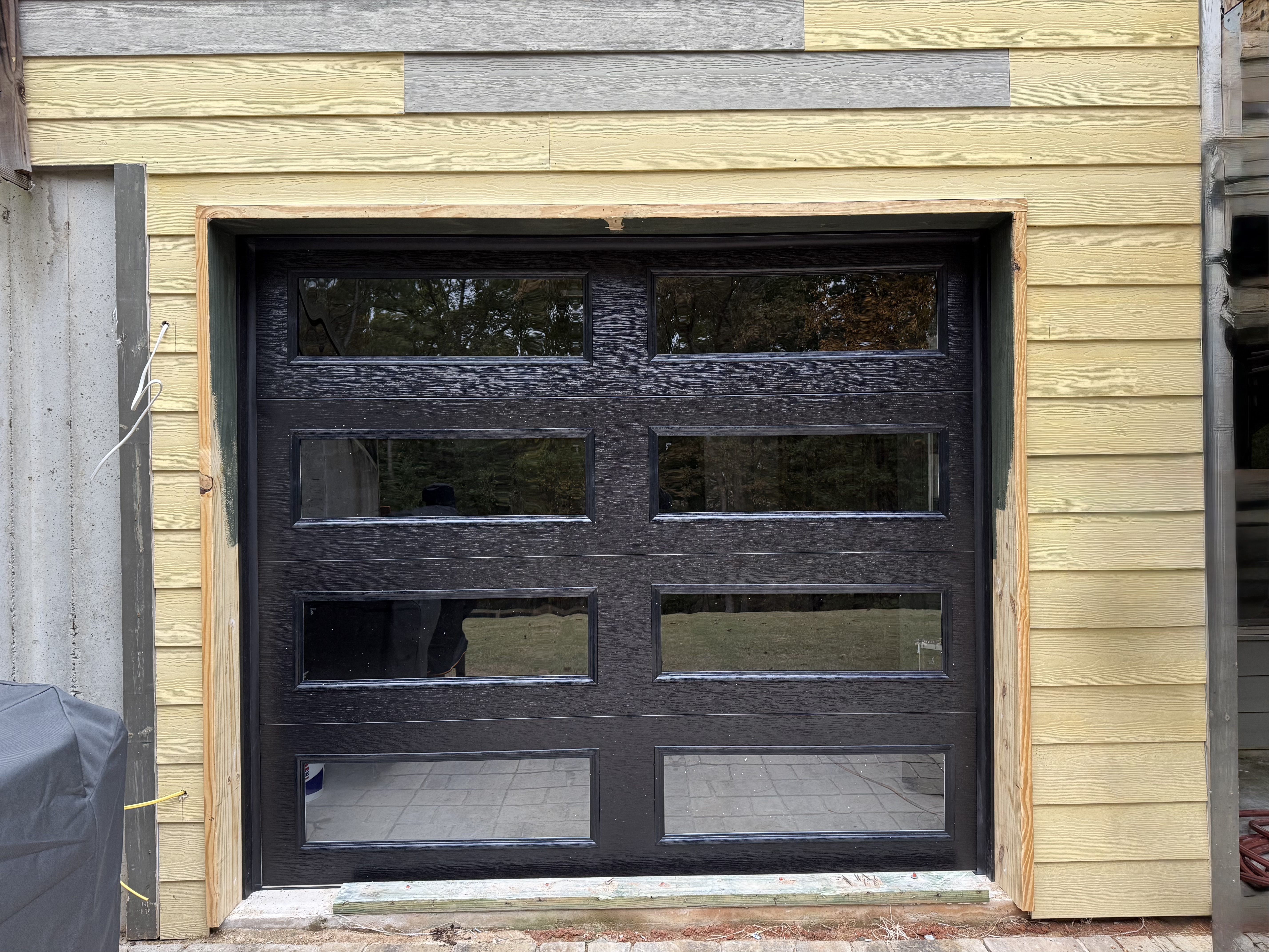 Modern black garage door installation in Atlanta area