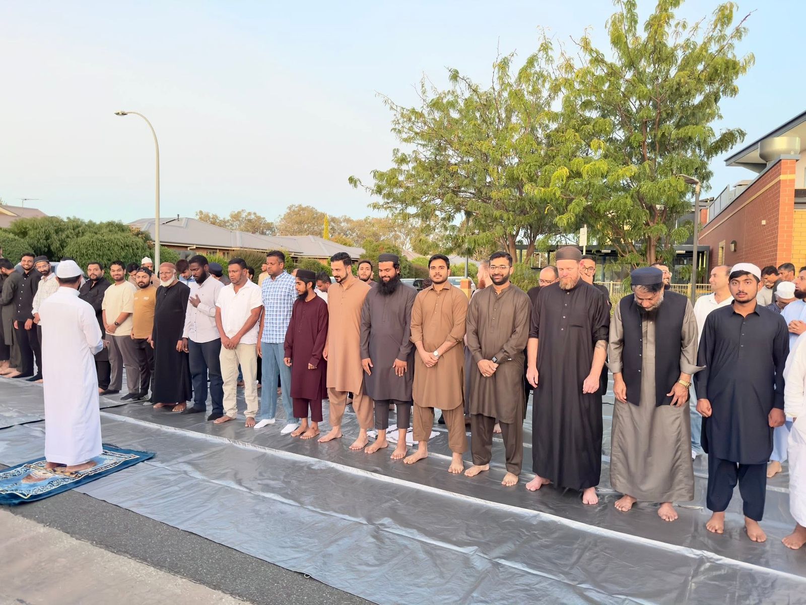 Eid prayer outdoors at sunrise