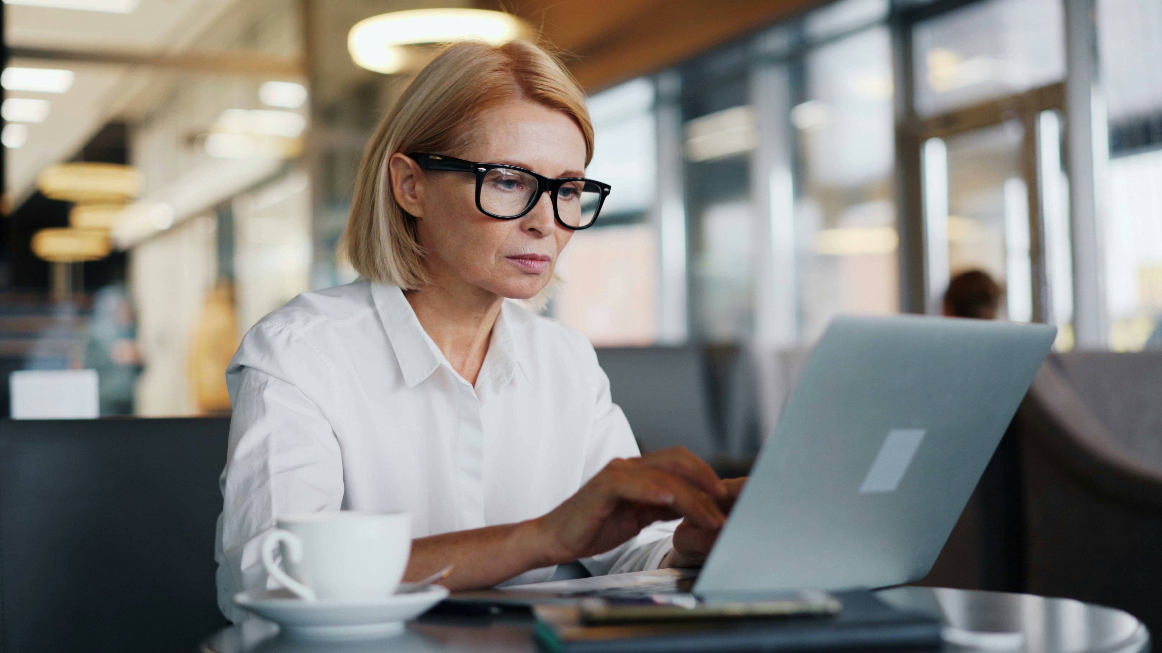 Professional accountant at desk — professional services business where first impressions and fast follow-up win clients