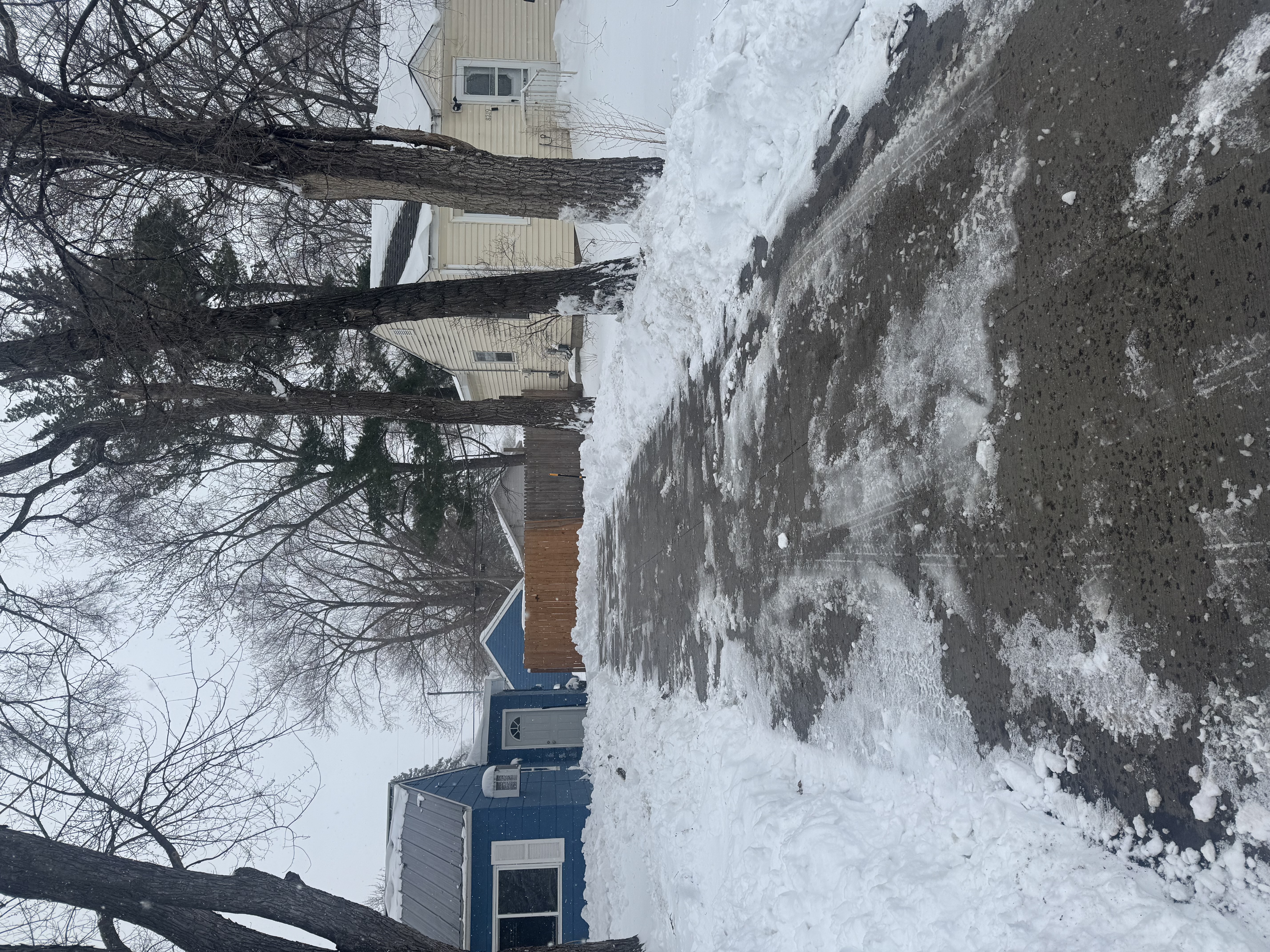 A driveway cleared of snow by NextGen Hauling