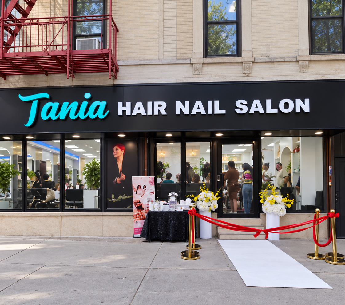 Tania Hair Nail Salon storefront at 601 E 186th St, Bronx, on grand opening day