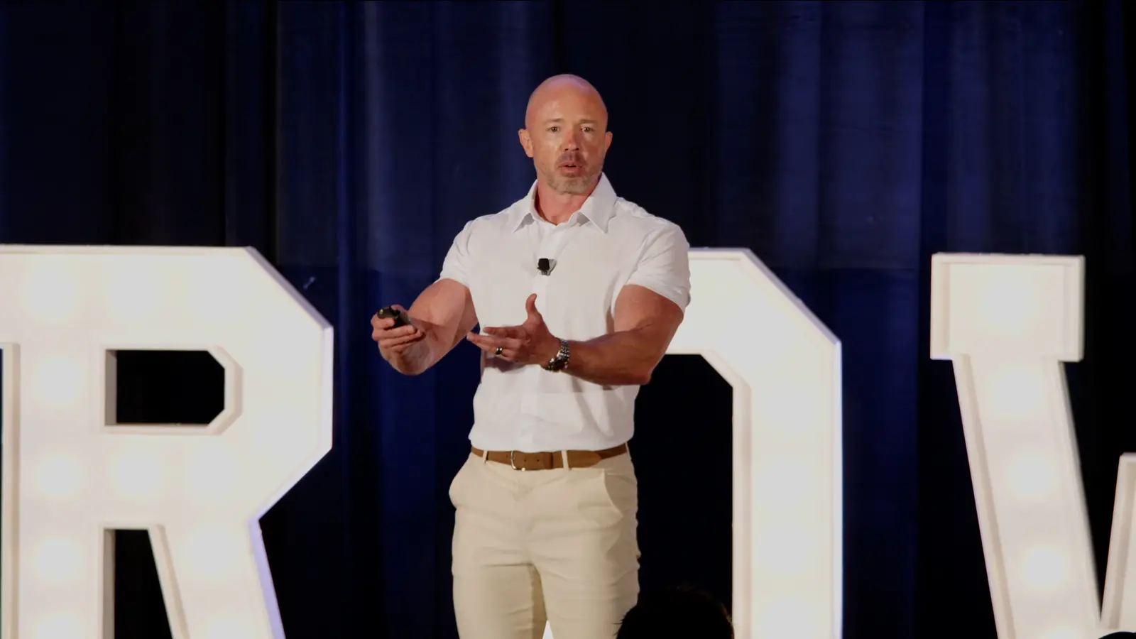 Scott Carpenter speaking on stage