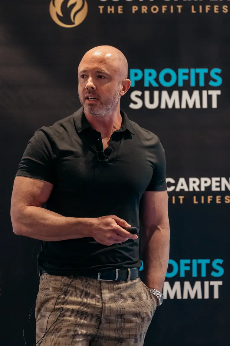 Scott Carpenter speaking at a summit