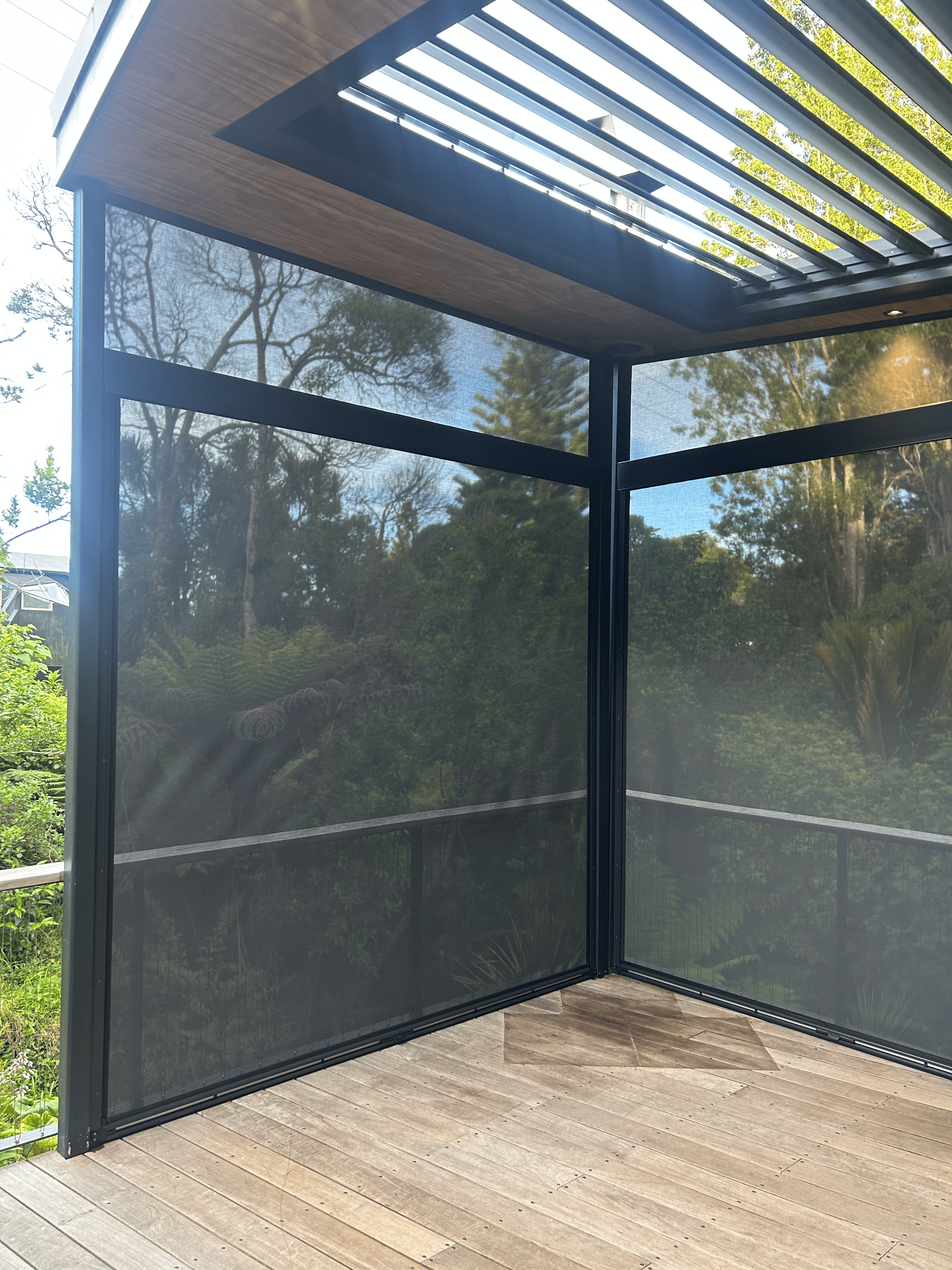 Ziptrak screens on home exterior