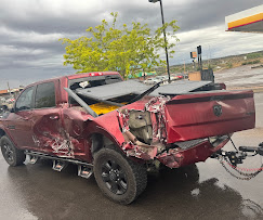 Wrecked pickup truck ready for removal