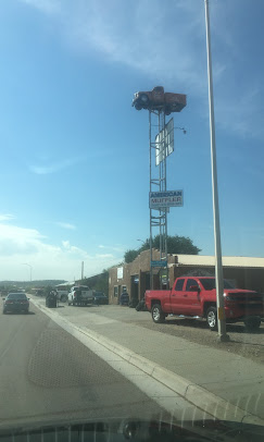 American Muffler & Towing sign tower on N 9th Street, Gallup NM