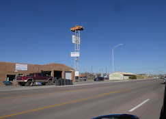 Shop street view with sign tower