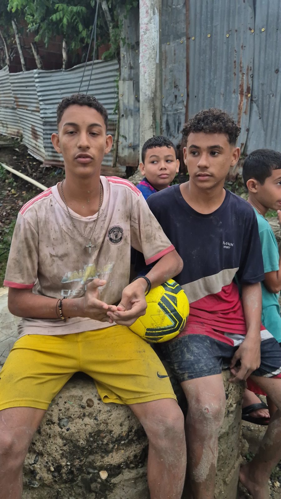 Young footballers with a yellow ball
