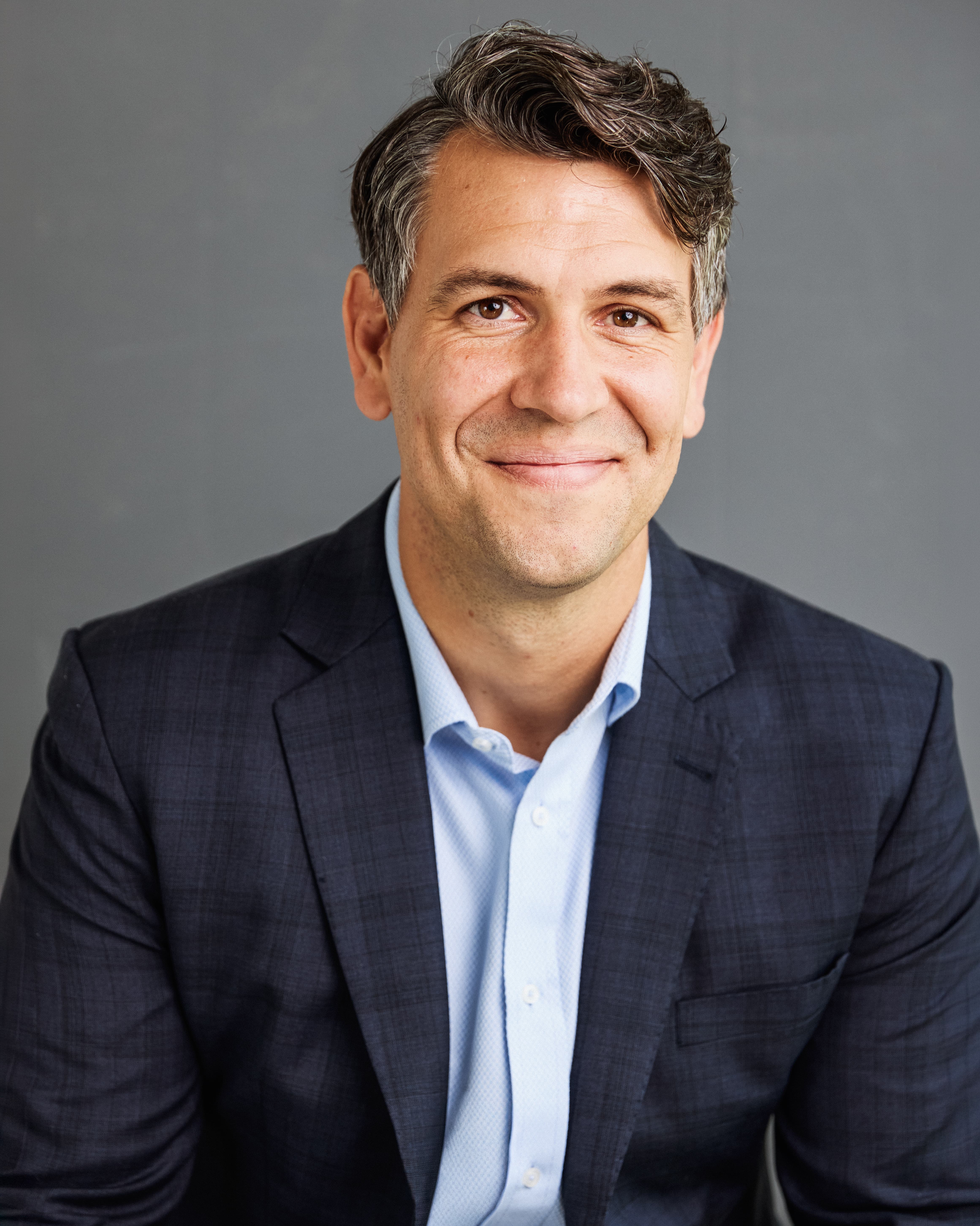 Professional headshot by Emily Cummings
