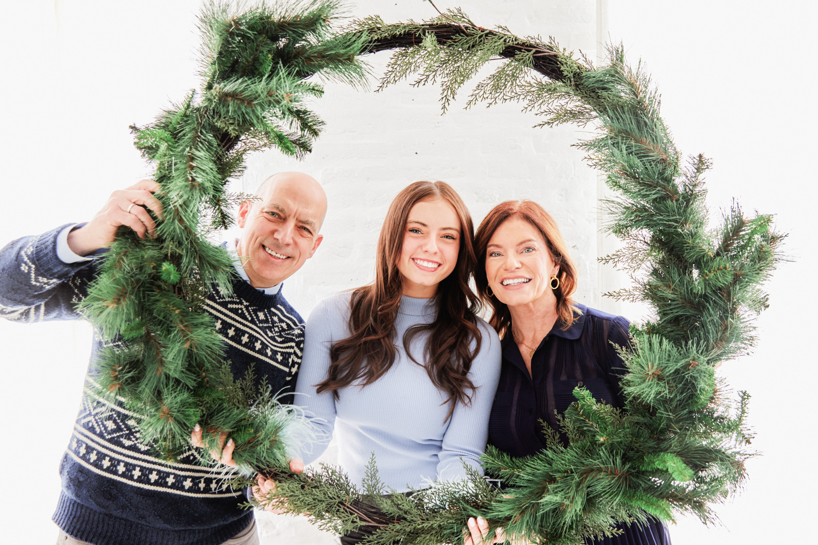 Family Christmas portrait by Ten Little Bluebirds