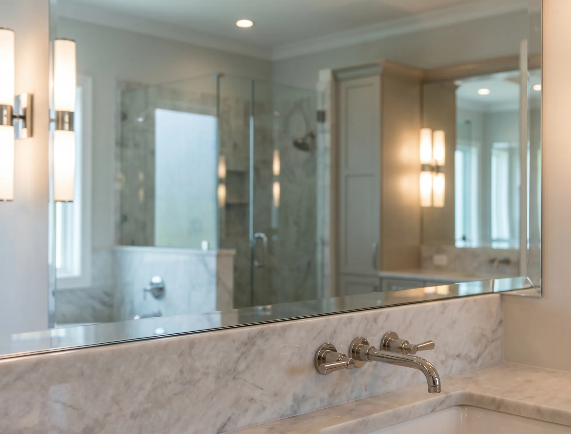 Custom-sized bathroom vanity and mirror measured to fit a Naples bathroom layout perfectly