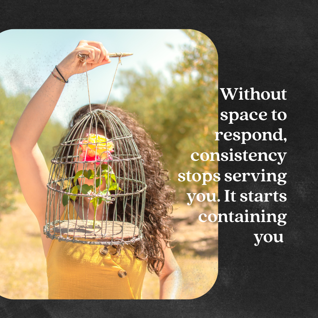 A woman holds an open bird cage against a bright background, symbolising the moment consistency becomes a constraint — and the freedom that comes from giving yourself space to respond. Rooted in Presence podcast, episode 136