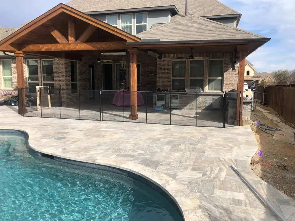 Gray mesh safety fence with silver poles