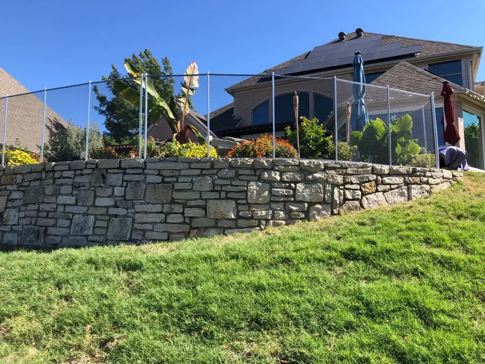 Gray mesh safety fence with silver poles