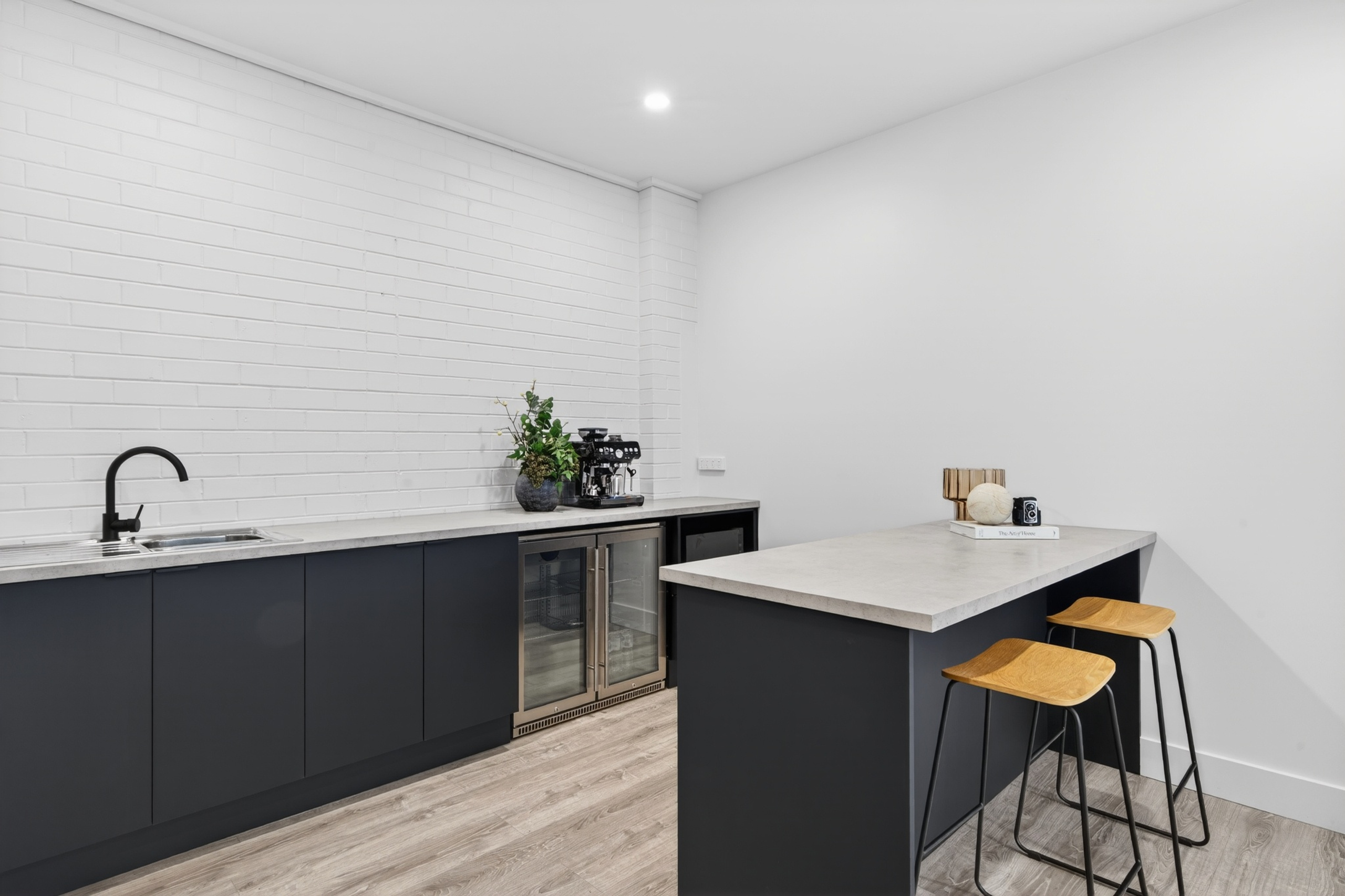 Studio kitchenette with coffee machine and drinks fridge