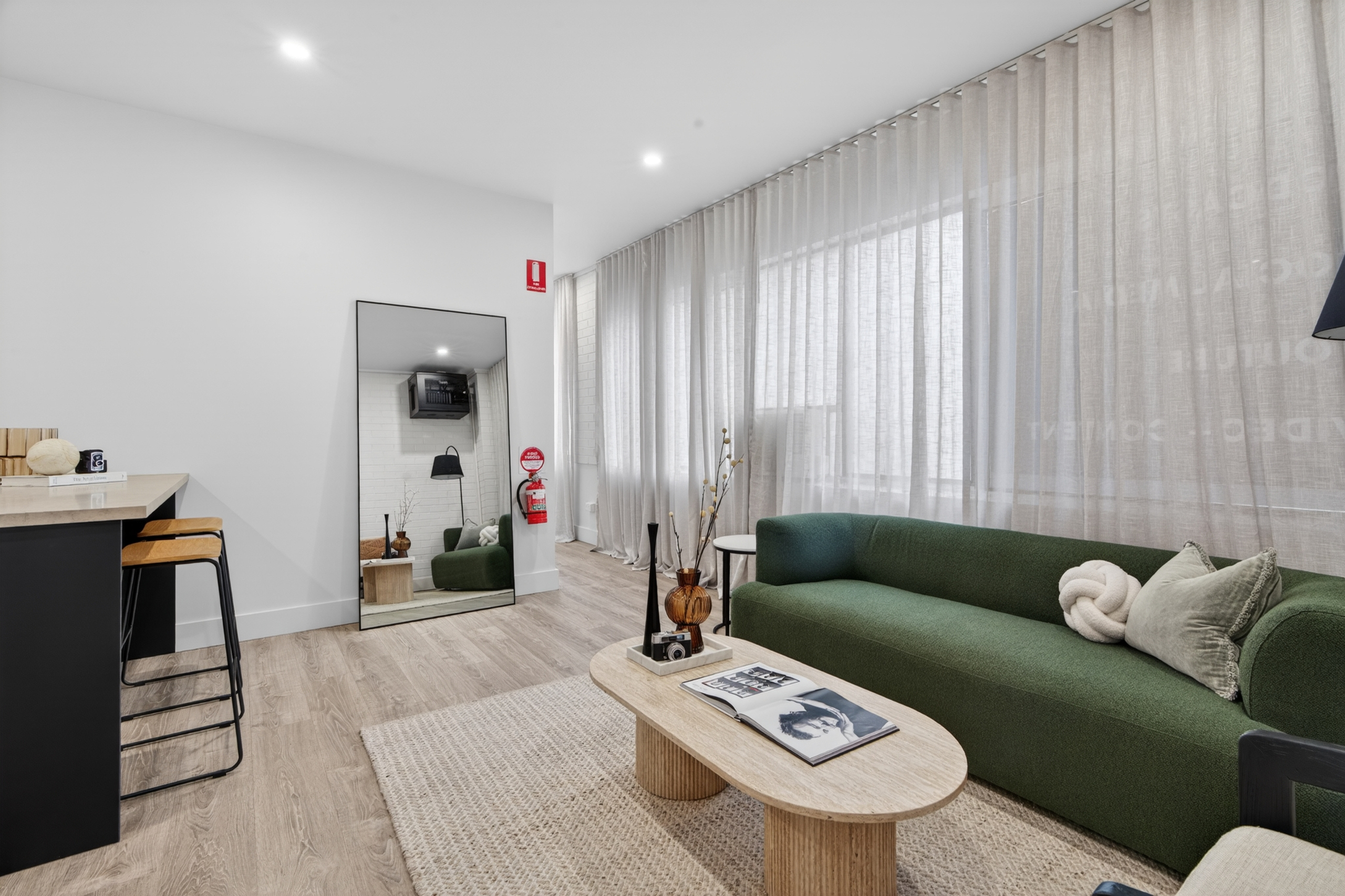 Studio lounge with sheer curtains