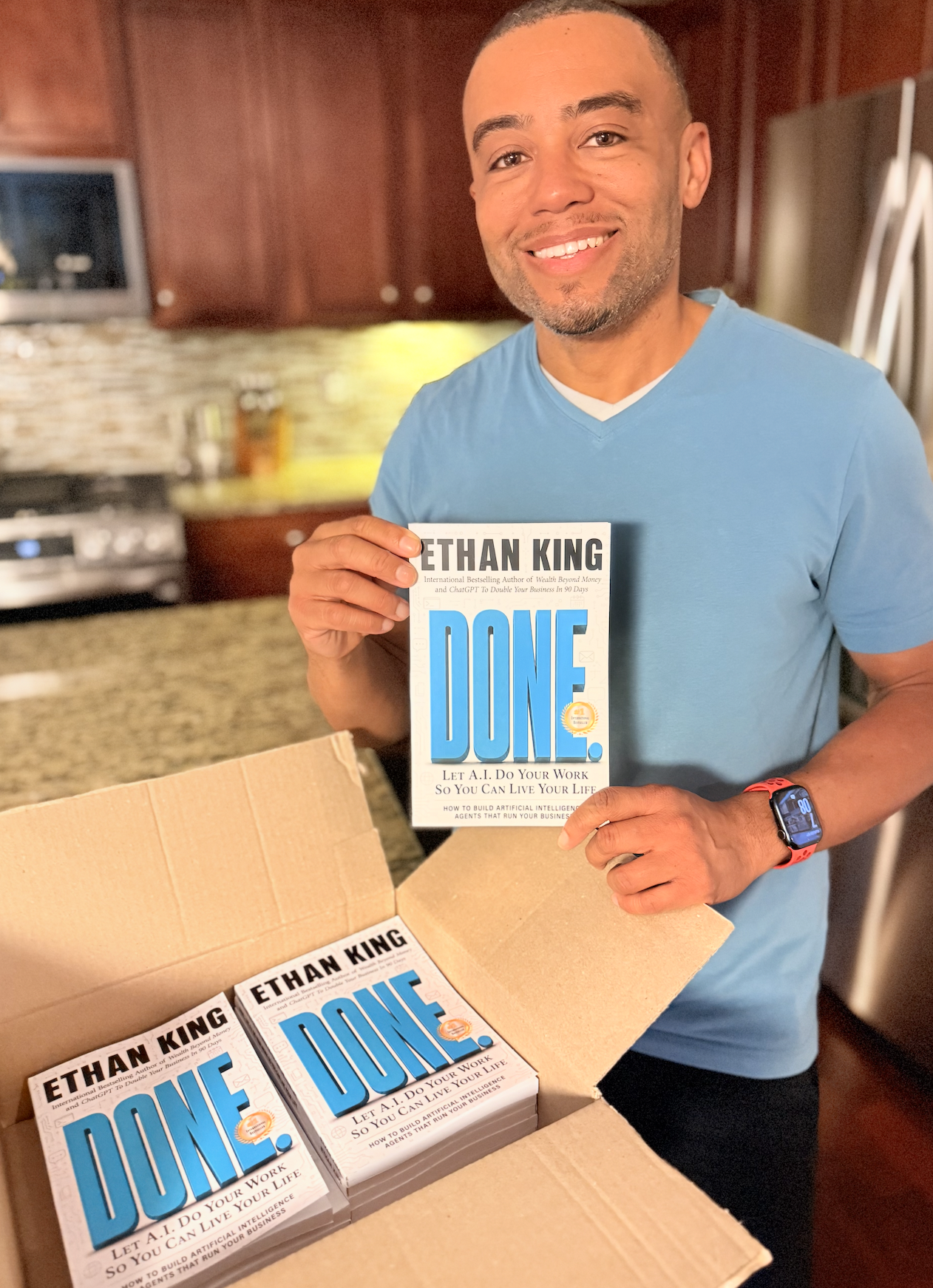 Ethan opens box of "Done" books