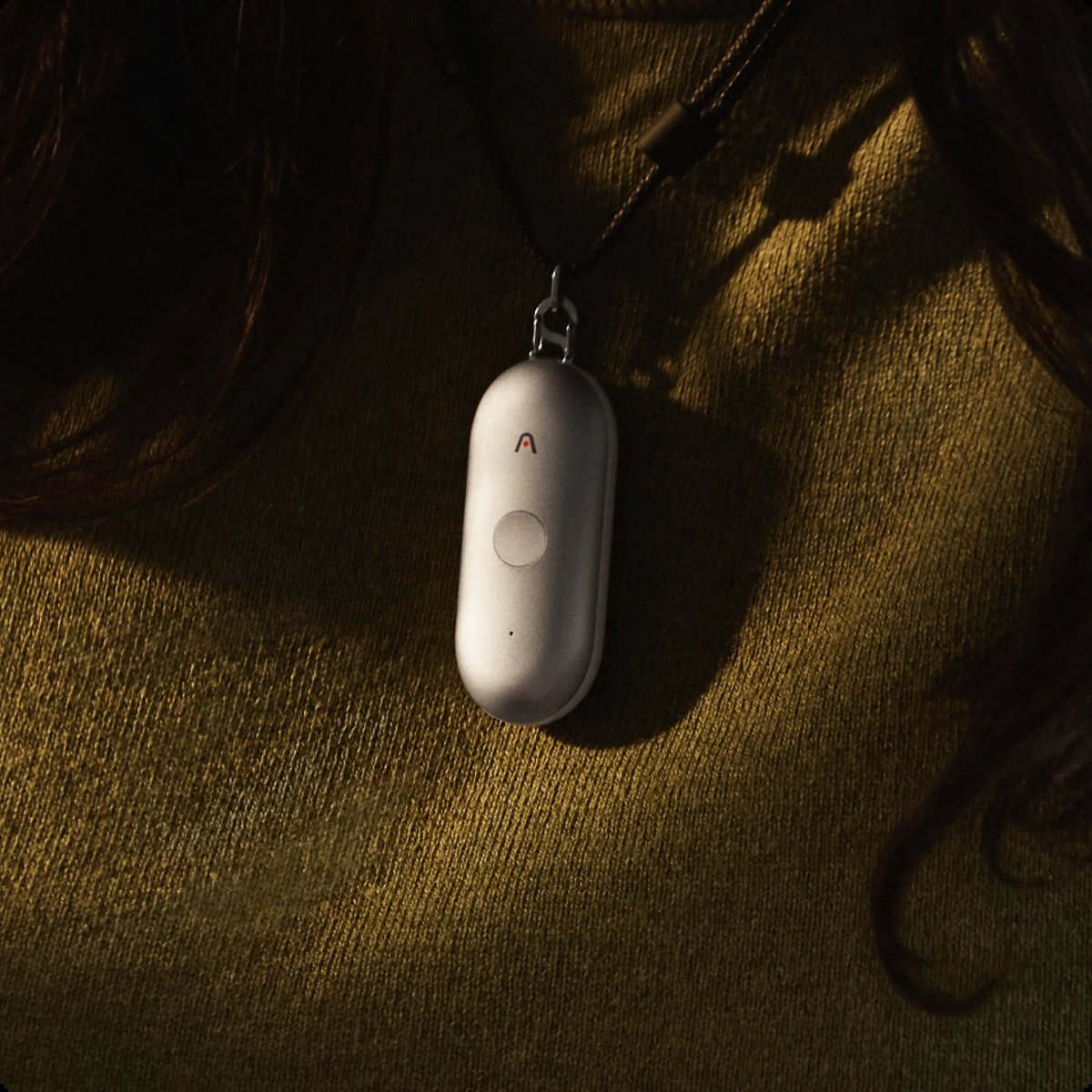 Plaud NotePin wearable AI note taker worn as a necklace