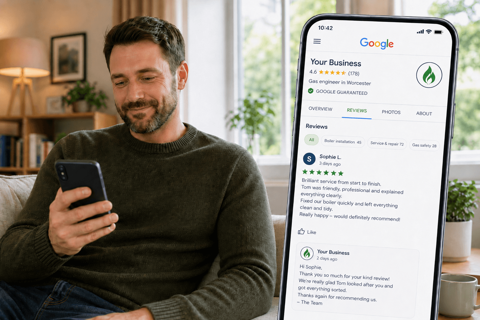 Gas engineer relaxing at home in a dark green jumper, smiling as he reads a 5-star Google review from customer Sophie L on his smartphone — screen shows a professional business response already posted alongside 178 reviews and a 4.6 star rating for a gas engineer in Worcester, illustrating how HomeFix Network's Repeat service writes and posts professional replies to every Google review automatically