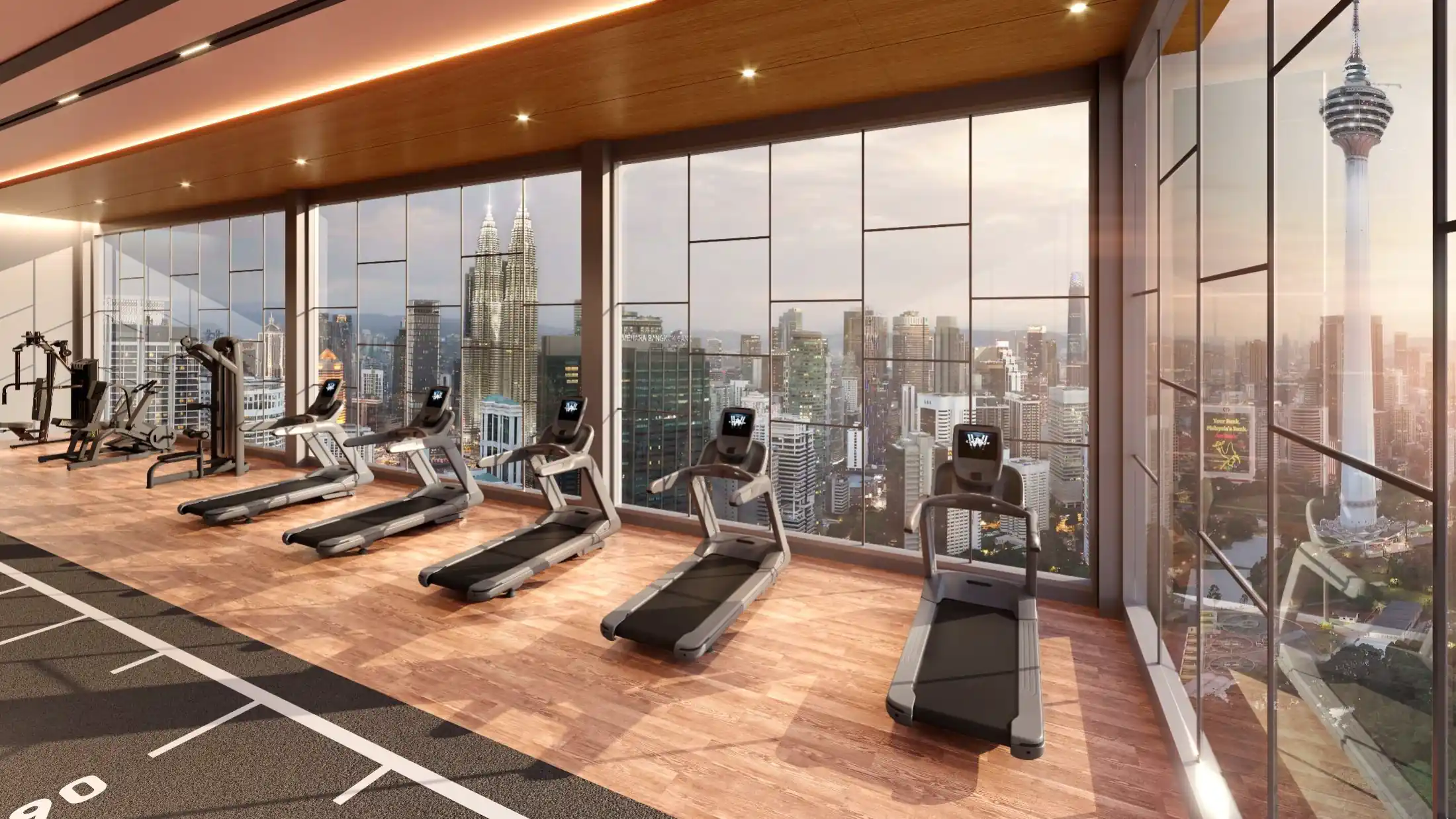 Sky Gym fitness center overlooking KLCC skyline