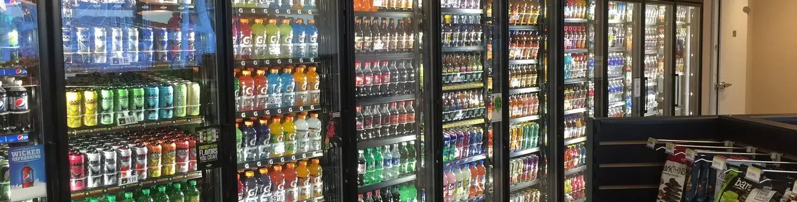 Beverage coolers stocked inside a store
