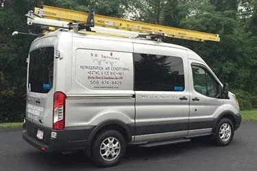 R.R. Services service van parked at a job site