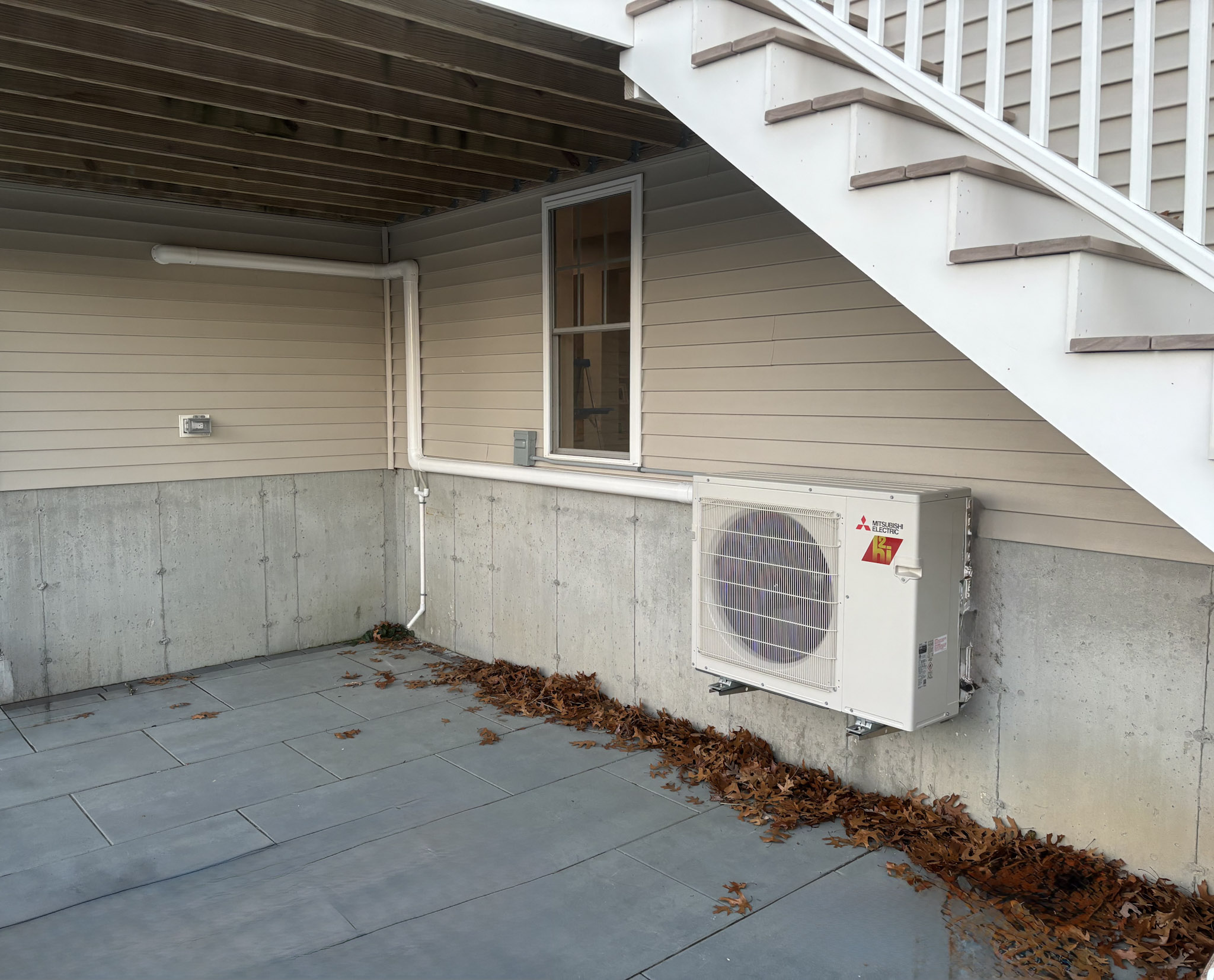 Mitsubishi ductless outdoor unit installed at a home