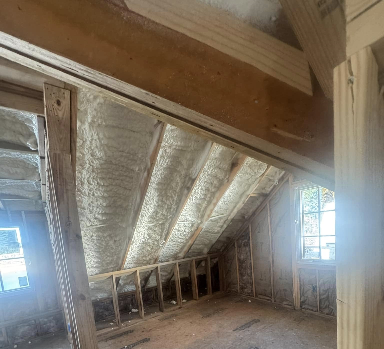 Blown-in insulation installed in attic for fast, efficient coverage in Panama City FL by Blue Line Insulation