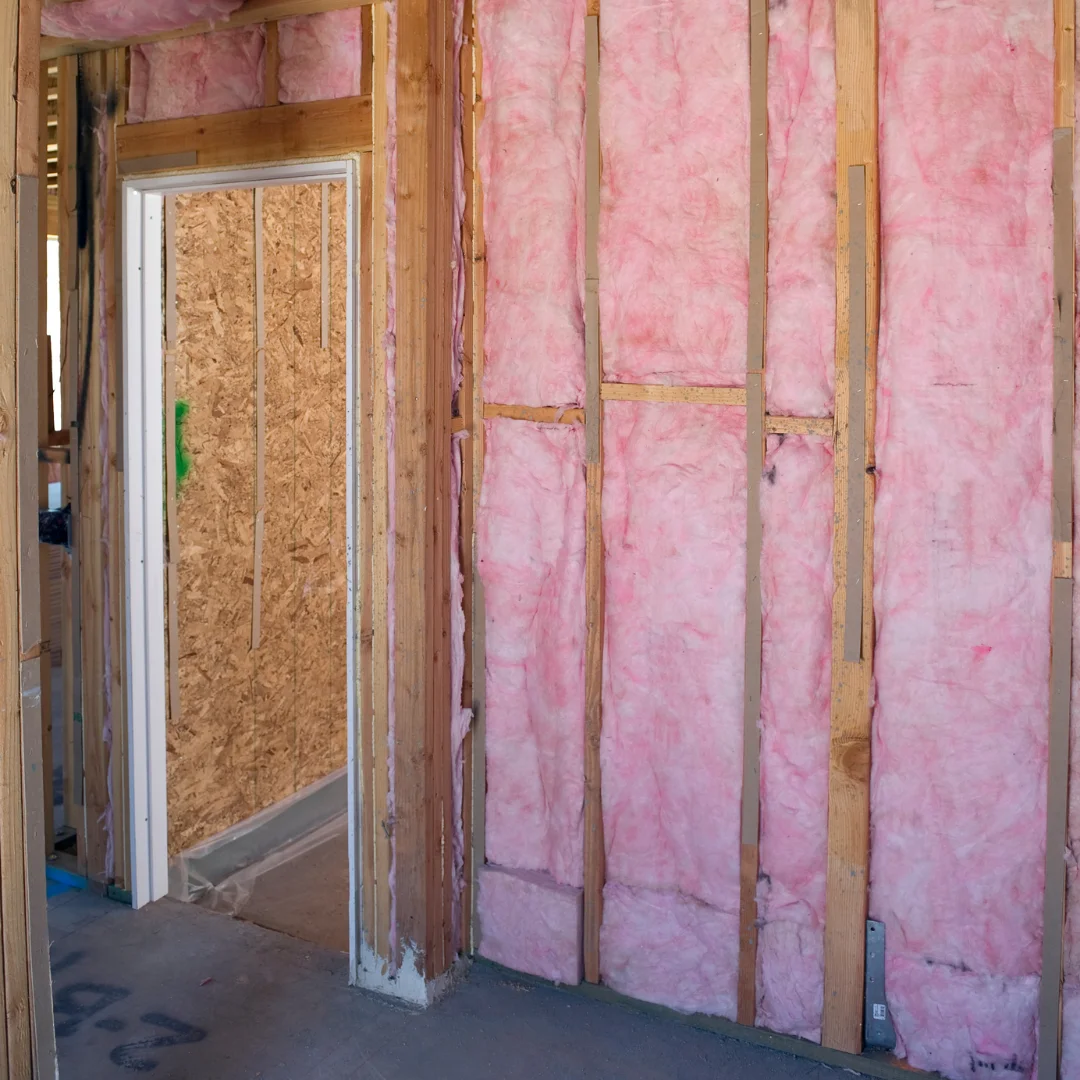 Fiberglass batts insulation installed in framed wall cavities in Port Saint Joe FL by Blue Line Insulation