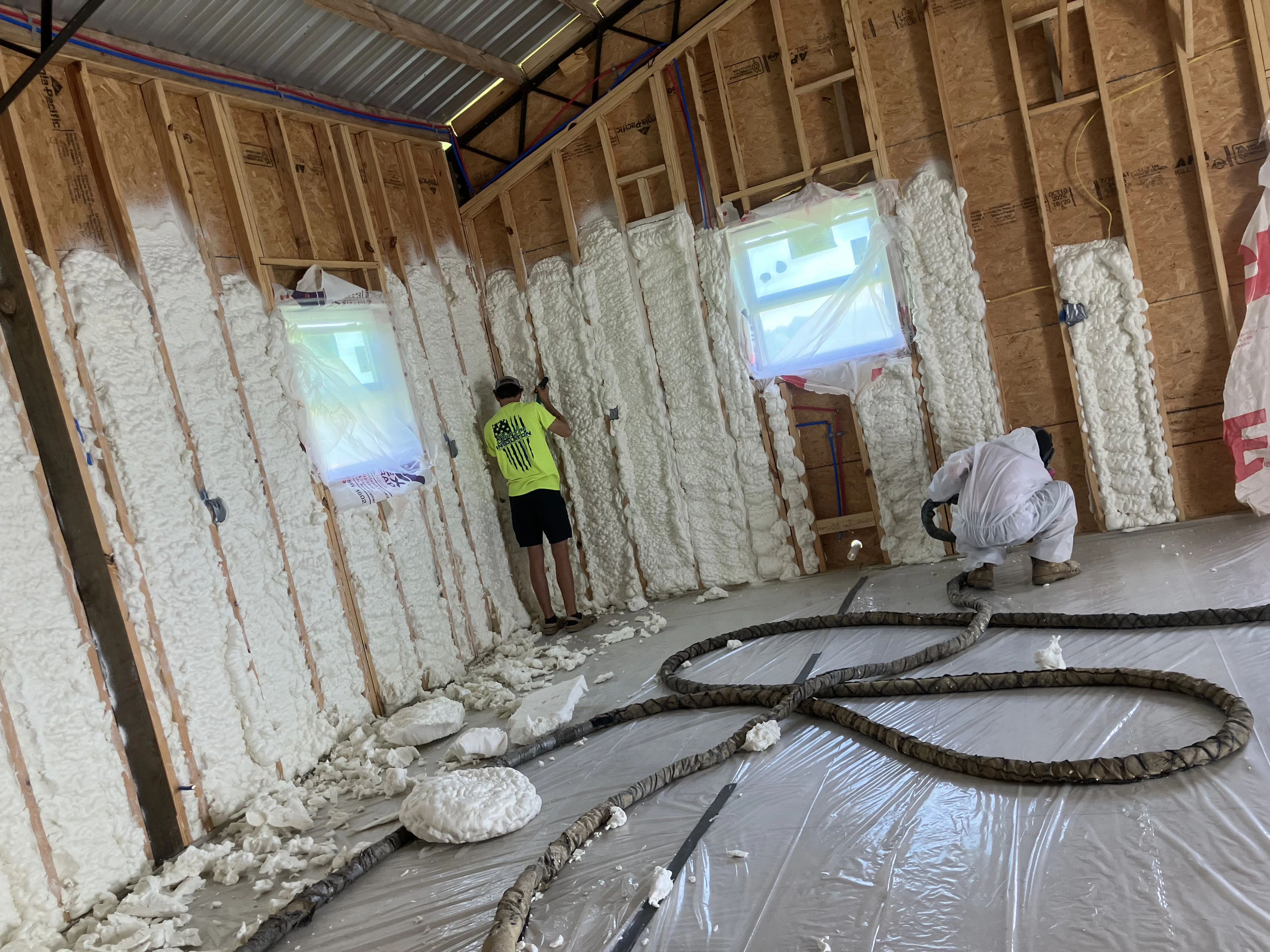 Open-cell spray foam insulation improving energy efficiency in attic walls in Panama City FL