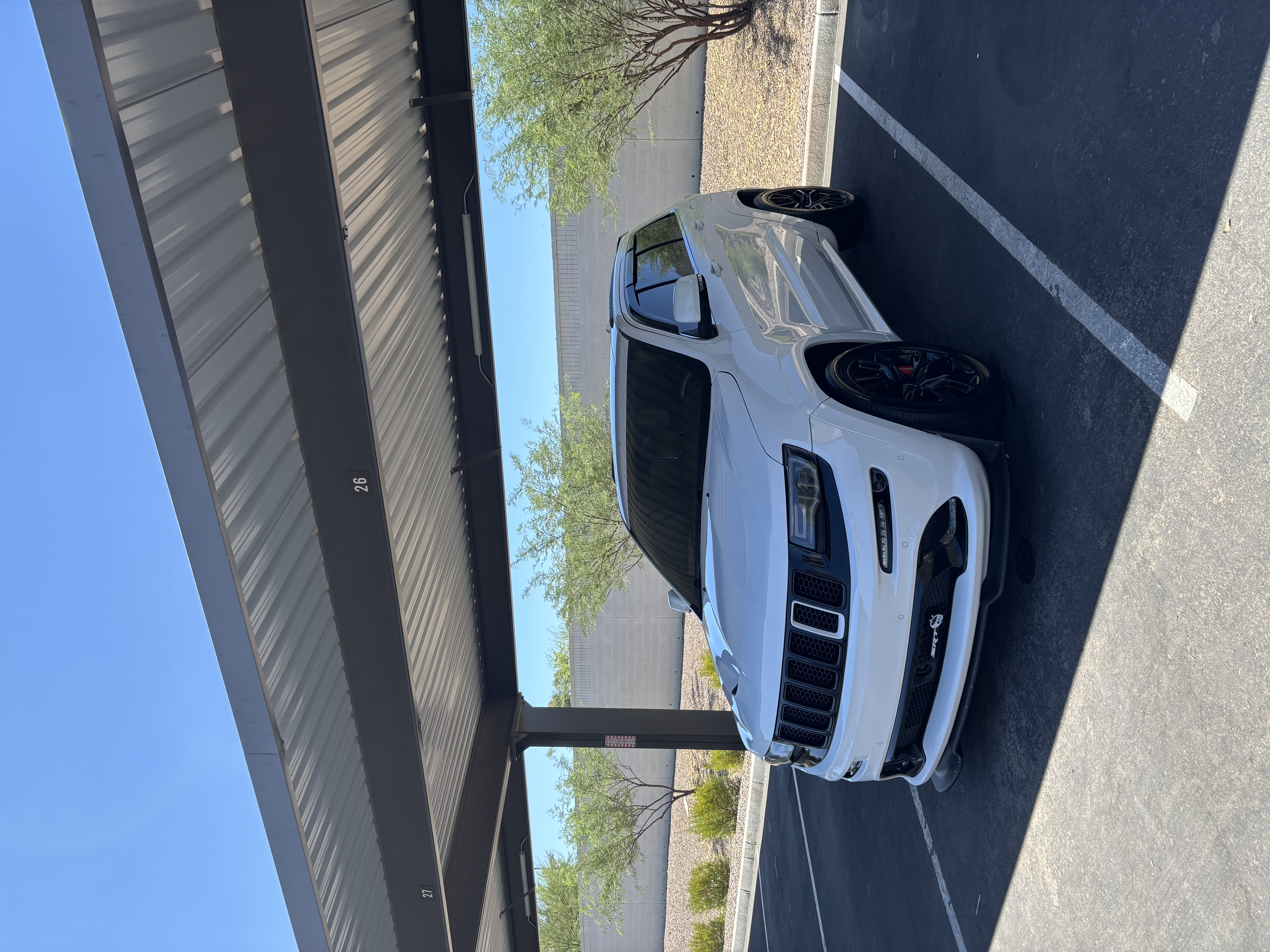 White Jeep Grand Cherokee SRT finished detail, front three-quarter view