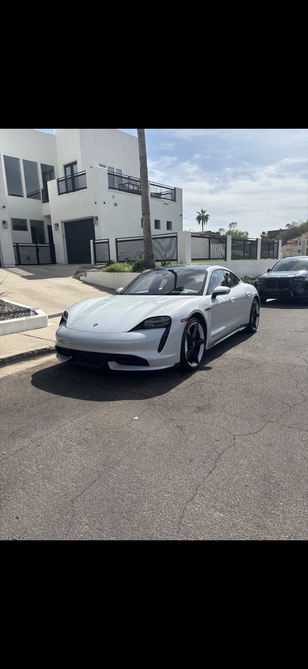 Porsche Taycan finished detail, front three-quarter view