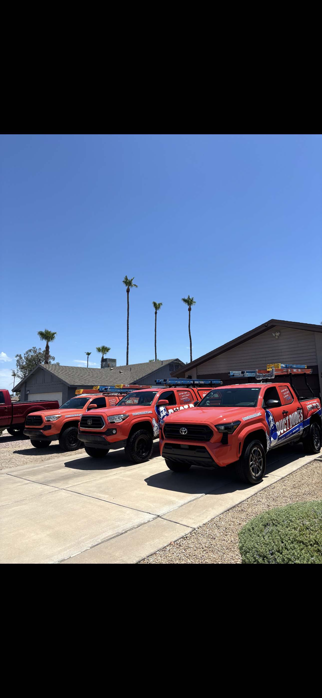 RnM Detailing fleet wash, branded service trucks lined up