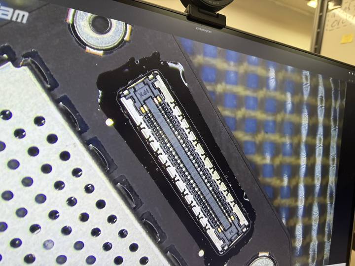 Replaced board connector under the microscope