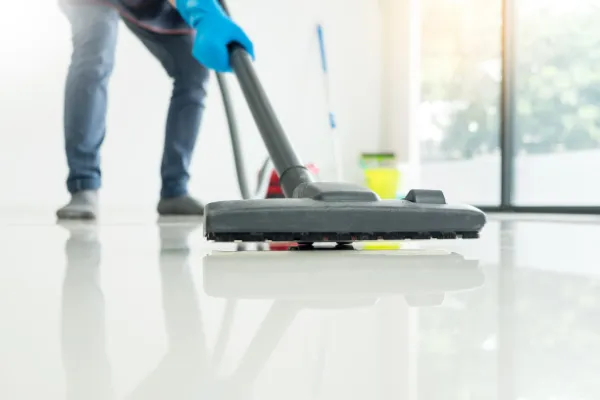 Carpet cleaning machine on flooring
