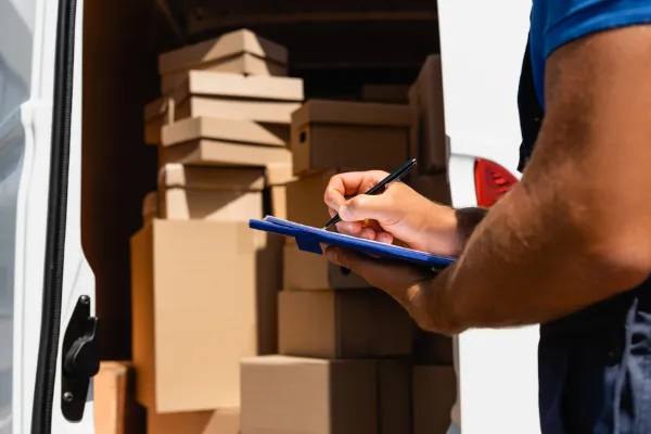 Movers carrying boxes